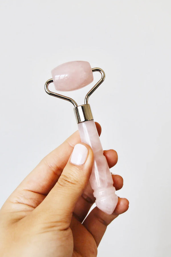 The Mini De-Puffing Rose Quartz Roller
